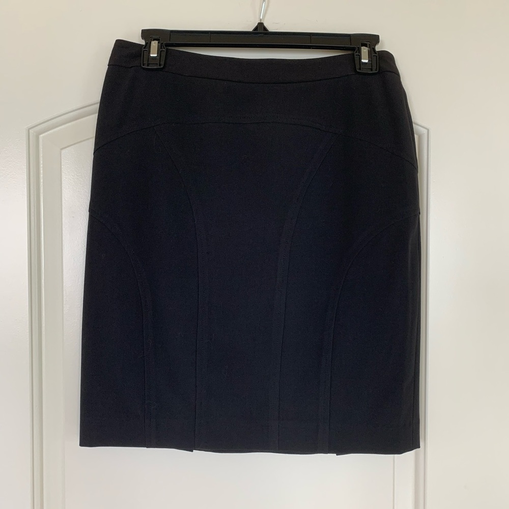 Black skirt above the knee